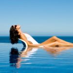 Relaxing in an Infinity Pool with Sea View - Top 10 Luxury Mykonos Hotels by Mykonos-Hotels.com
