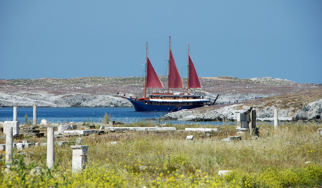 Delos Island, Greece - Ancient Ruins and Sailboat