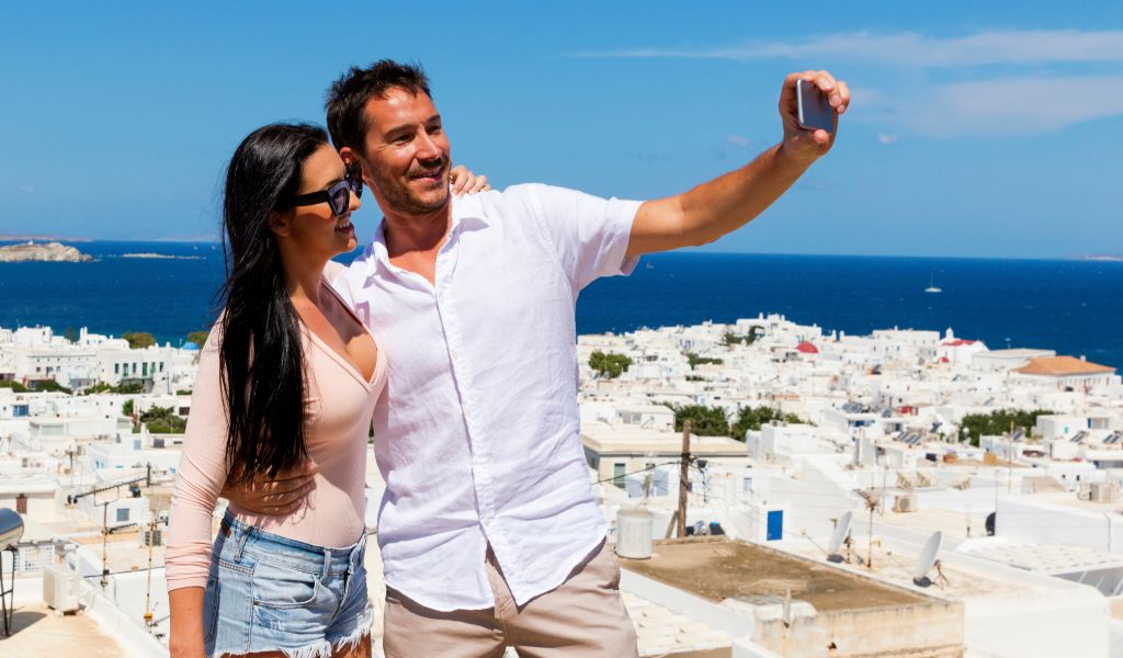 Couple taking selfie – Mykonos Weather
